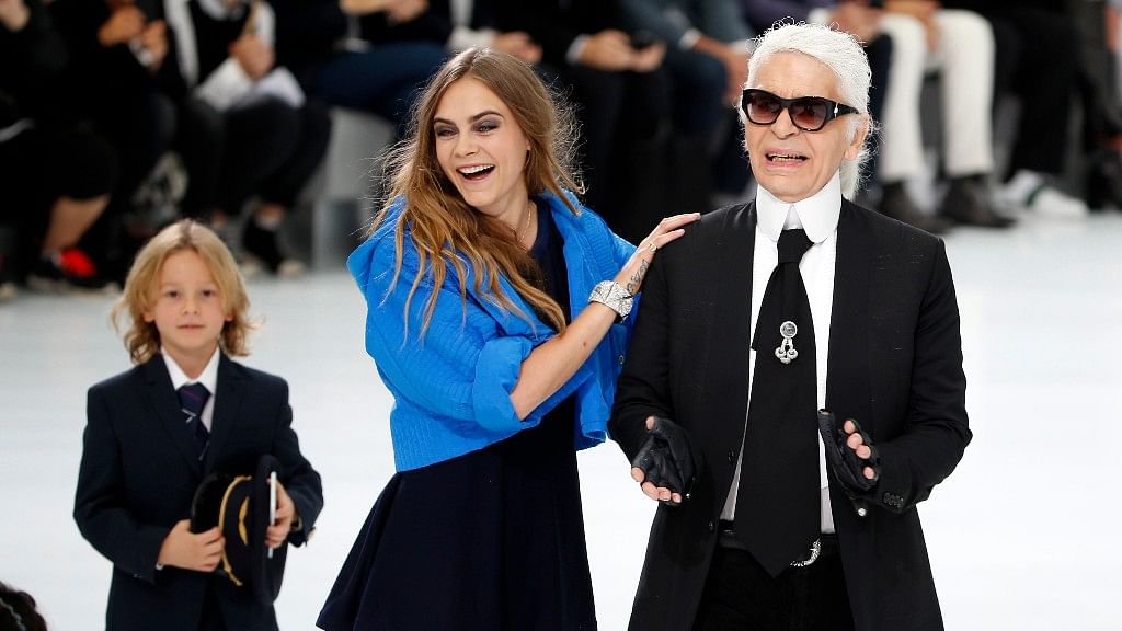 Karl Lagerfeld with model Cara Delevingne<em>.</em>