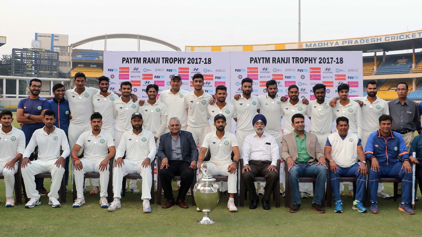 Vidarbha players with the trophy after winning their maiden Ranji Trophy cricket title defeating Delhi by nine wickets in the Ranji Trophy final.&nbsp;