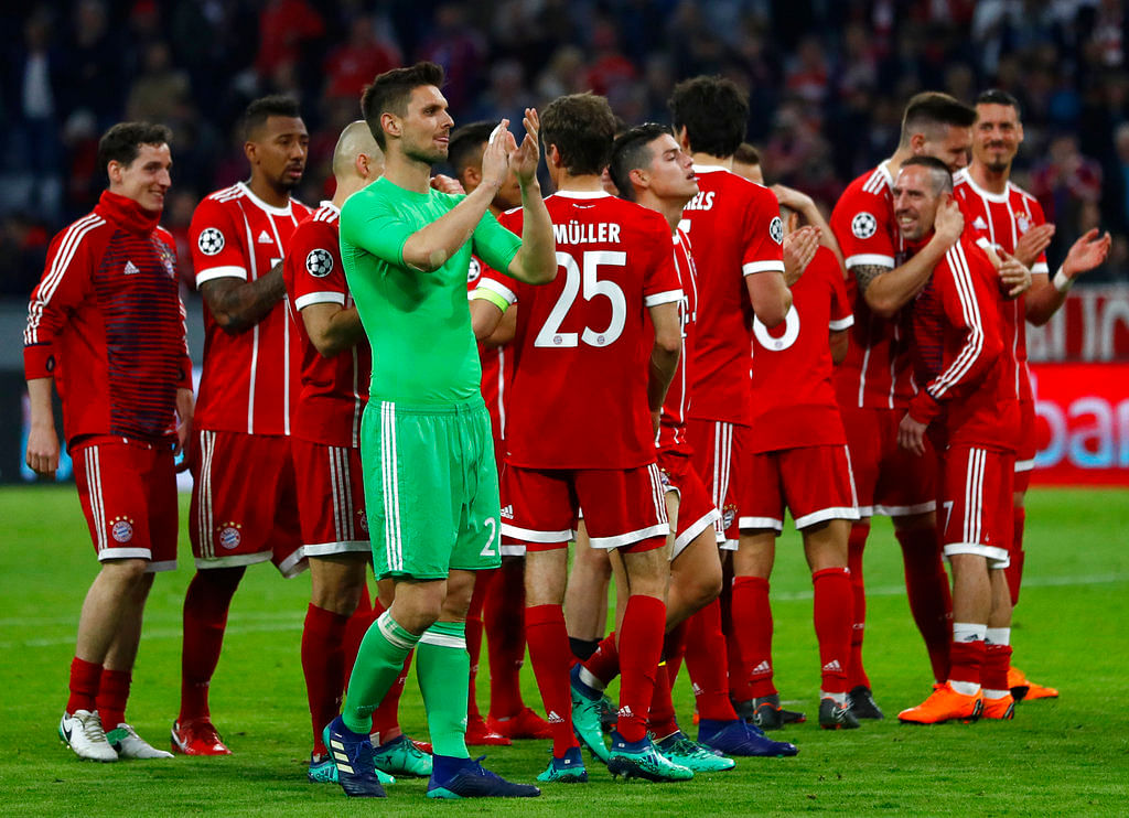 A goalless draw against Sevilla was enough to send Bayern Munich into the Champions League last four.