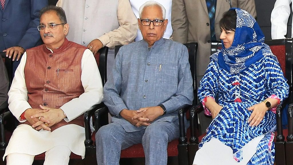 File image of Jammu &amp; Kashmir Governor  NN Vohra, Chief Minister Mehbooba Mufti and Dy Chief Minister Kavinder Gupta at the swearing-in ceremony after the cabinet reshuffle.