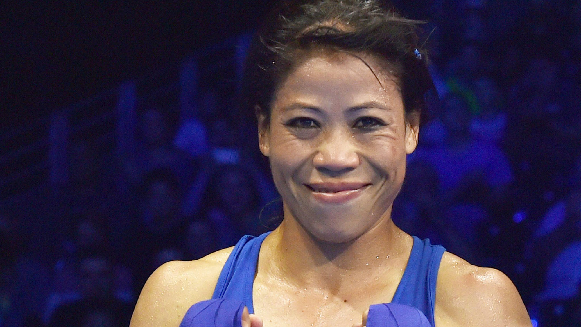 MC Mary Kom is all smiles after winning the semifinal bout at the 2018 Commonwealth Games.