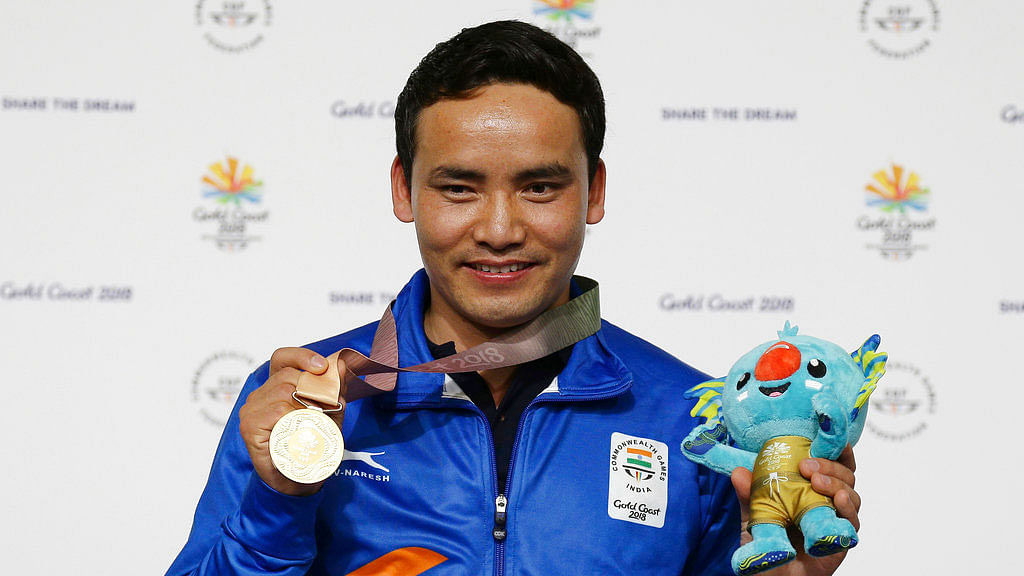 Jitu Rai with the gold medal in the 10 metre air pistol event at the 2018 CWG.