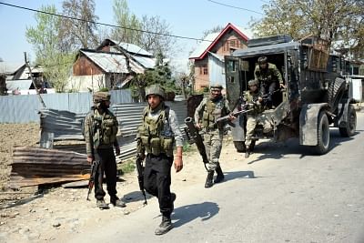 Shopian: Soldiers rush to the site where gunfights erupted between security forces and militants in Jammu and Kashmir