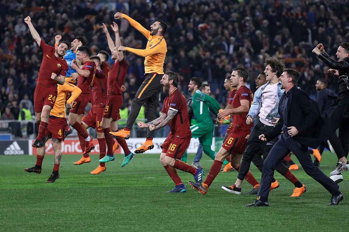 Roma players celebrate reaching the semifinals after the Champions League quarterfinal second leg soccer match between between Roma and FC Barcelona, at Rome’s Olympic Stadium, Tuesday, April 10, 2018. 