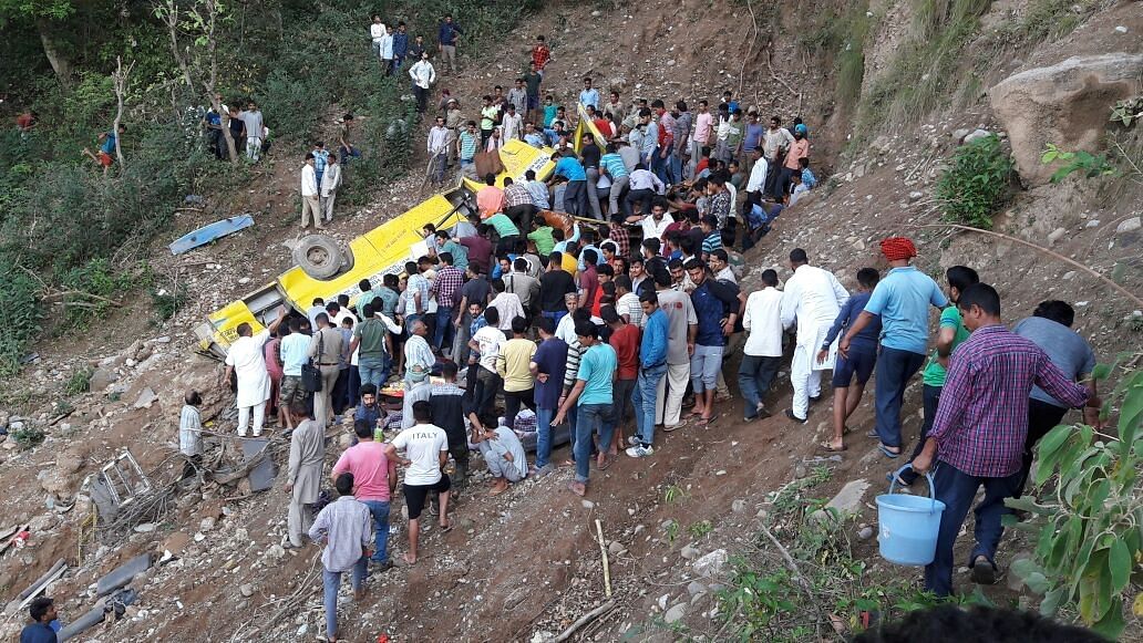 Locals rescue students stuck inside the school bus that fell into a gorge in Nurpur constituency in Himachal Pradesh’s Kangra district.