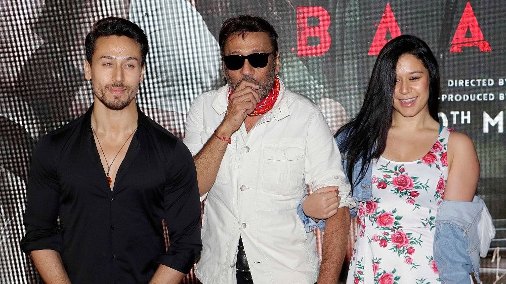 Tiger Shroff with father Jackie Shroff and sister Krishna Shroff at the the premiere of <i>Baaghi 2.</i>