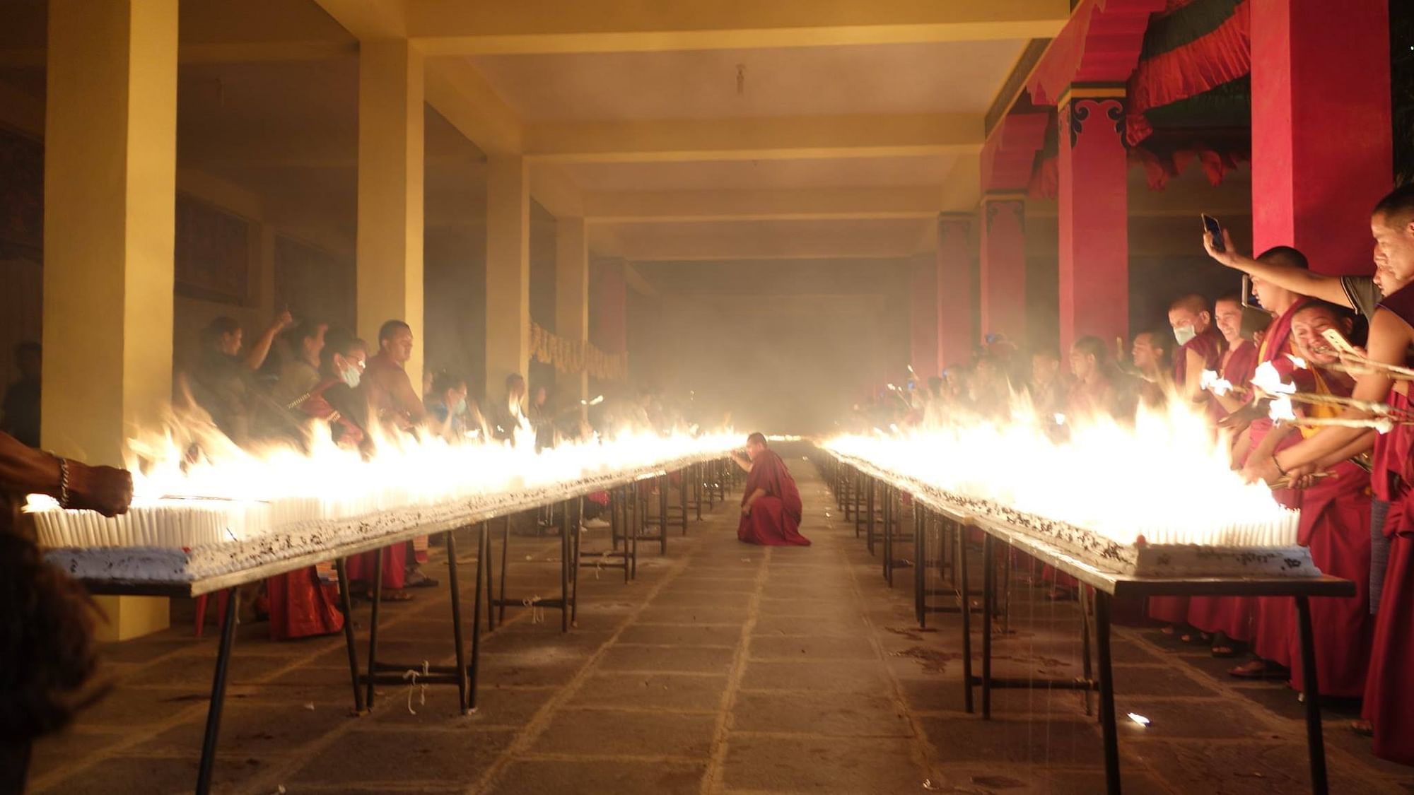 More than 200 Tibetans lit 1,30,232 candles, one for every Tibetan living in exile.