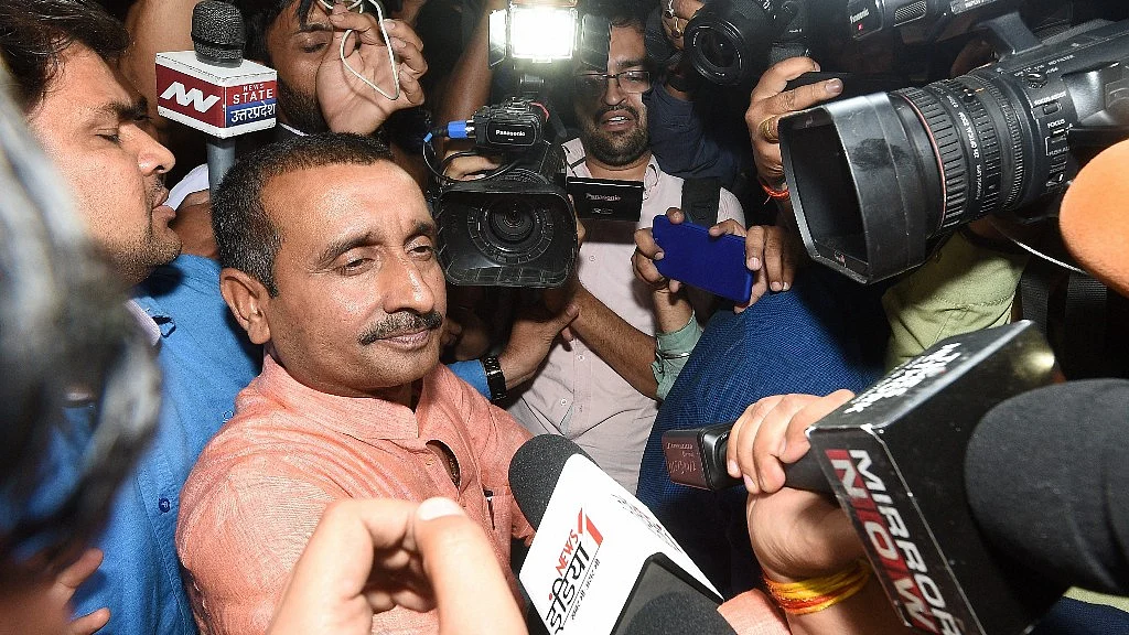 BJP MLA from Unnao Kuldip Singh Sengar, accused in a rape case, surrounded by media persons outside the office of the Senior Superintendent of Police in Lucknow on Wednesday night.