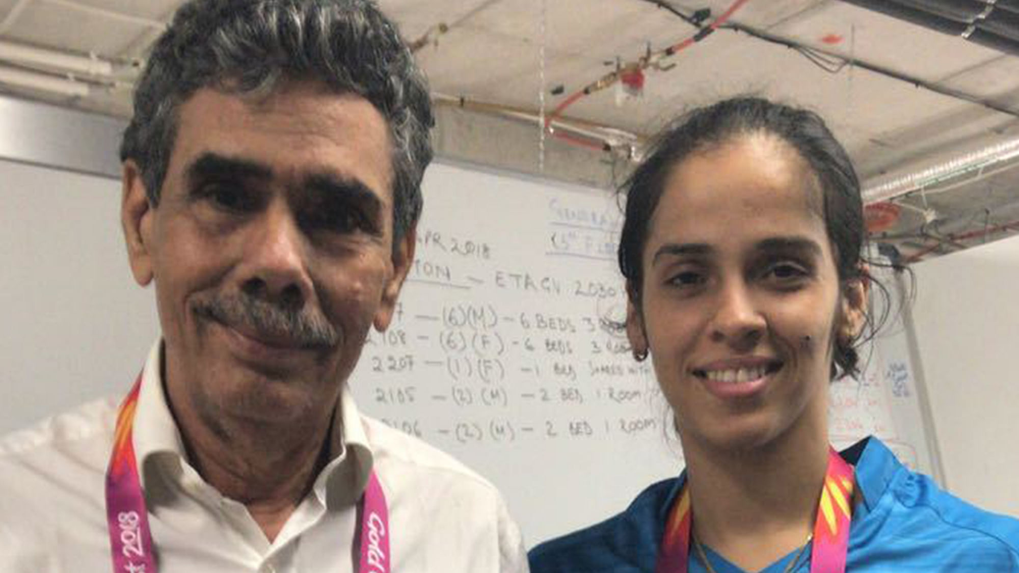 File picture of Saina Nehwal and her father.