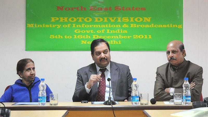 File photo of Frank Noronha (centre) talking at an event.