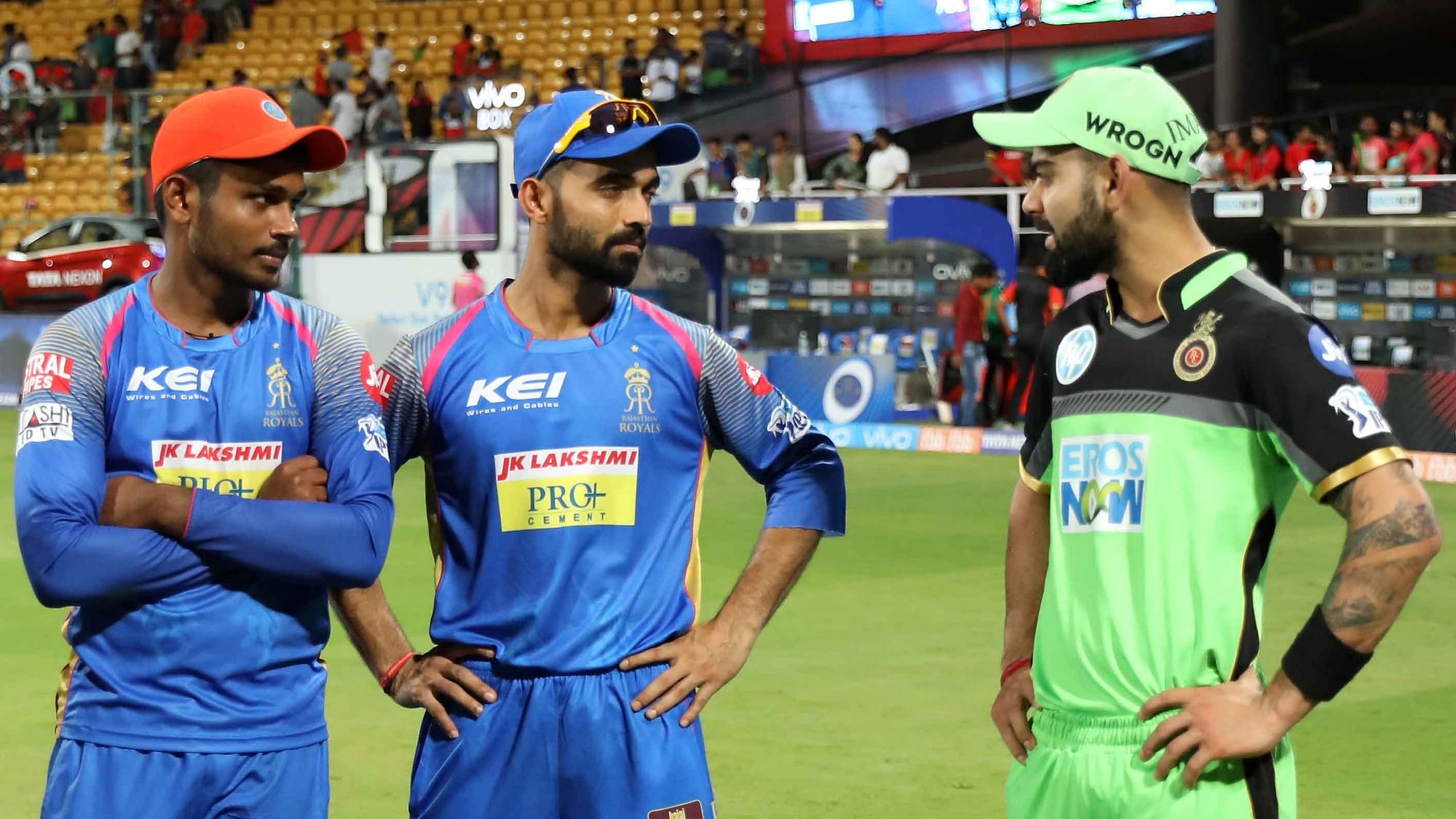 Sanju Samson of the Rajasthan Royals ,Ajinkya Rahane captain of the Rajasthan Royals and Virat Kohli captain of the Royal Challengers Bangalore during the presentation of the match eleven of the Vivo Indian Premier League 2018 (IPL 2018) between the Royal Challengers Bangalore and the Rajasthan Royals held at the M. Chinnaswamy Stadium in Bangalore on the 15th April 2018.