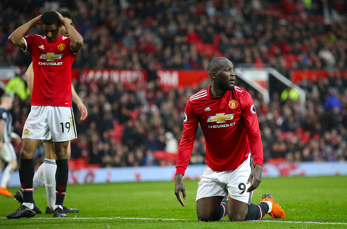 Manchester United gifted the Premier League title to Manchester City by losing 1-0 to last-place West Bromwich.