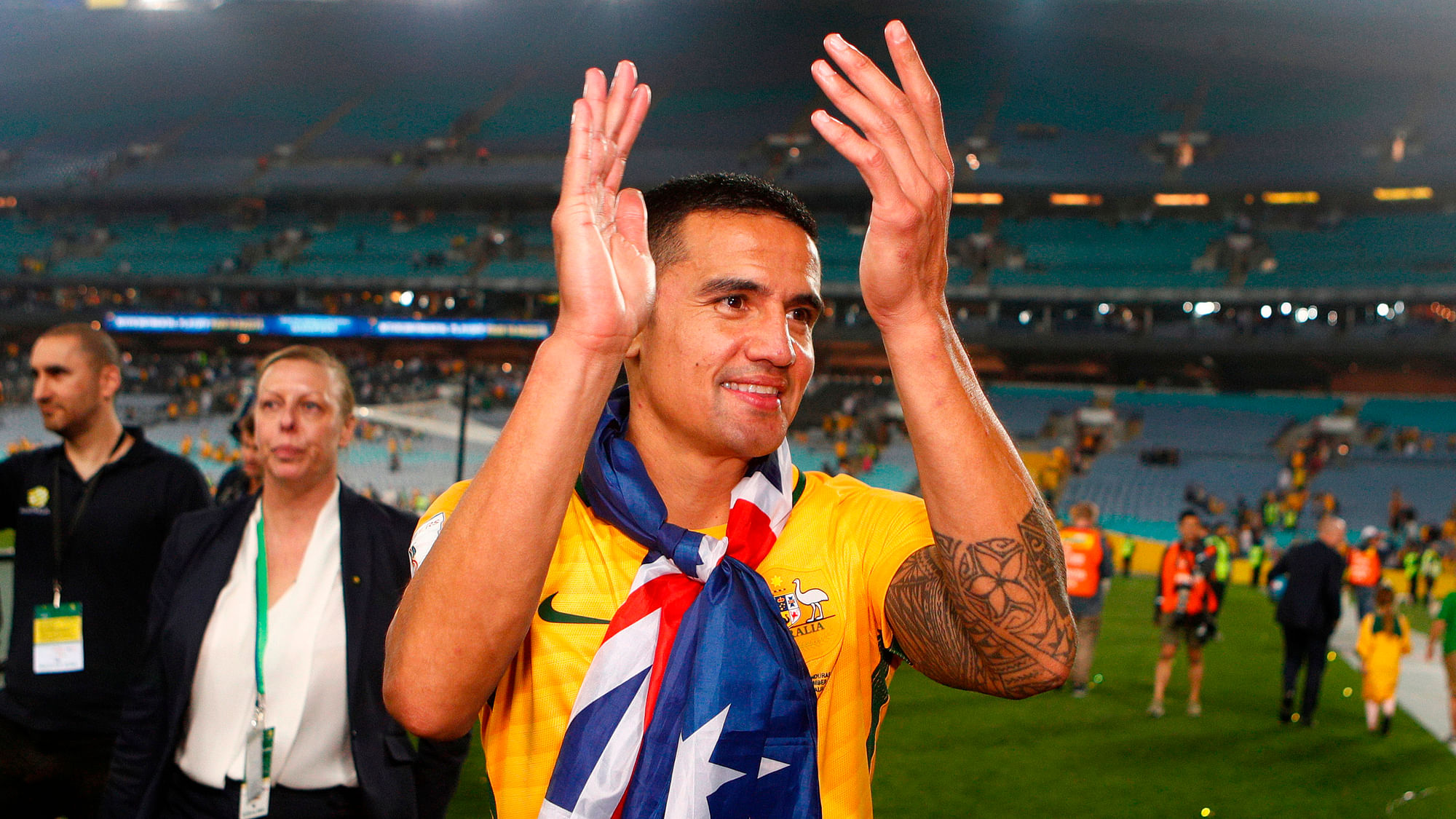 Australia’s Tim Cahill greets the crowd after defeating Honduras during their World Cup soccer playoff deciding match in Sydney
