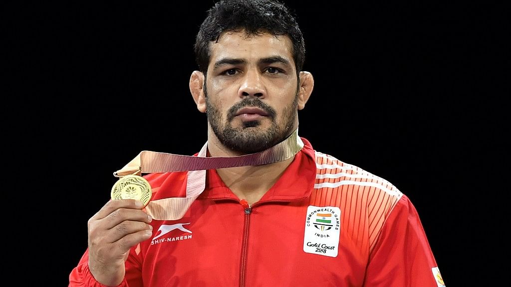 Sushil Kumar posing with his gold medal in Gold Coast on Thursday.