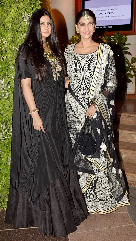 Sisters Rhea and Sonam Kapoor pose for the camera. 