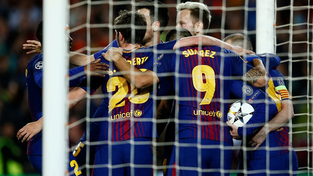 Barcelona’s players celebrates the opening goal of their team against Roma during the first leg of their Champions League quarter-final match against Roma at the Camp Nou last week.