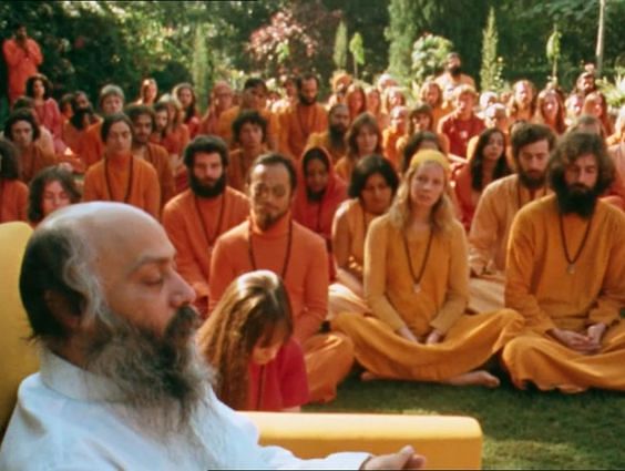 An explainer on how Osho created one of the most infamous cults in history, before the law caught up with him.