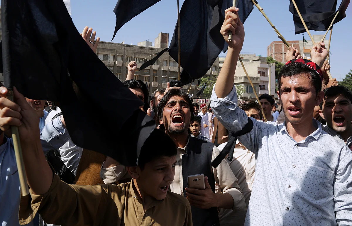 Supporters of Pashtun Protection Movement chant slogans during a rally in Lahore, Pakistan.