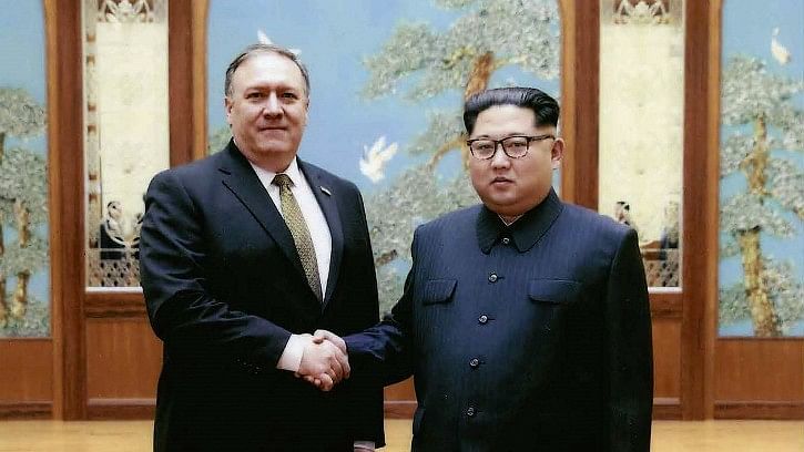 This image released by the White House shows the newly-appointed Secretary of State  Mike Pompeo shake hands with North Korean leader Kim Jong-un.