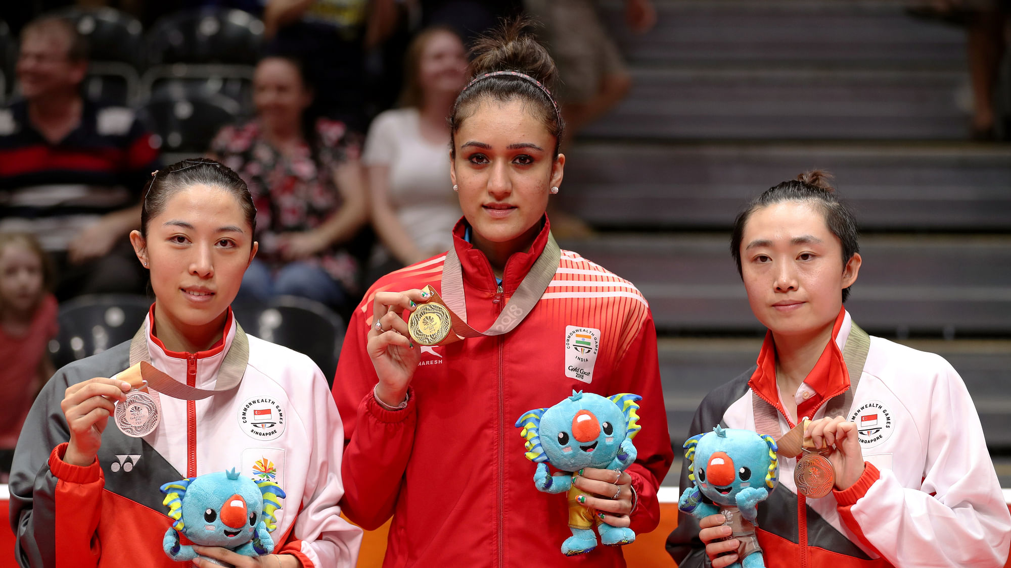 CWG 2018: Silver medalist Mengyu Yu of Singapore, gold medalist Manika Batra of India and bronze medalist Tianwei Feng of Singapore pose with medals.&nbsp;