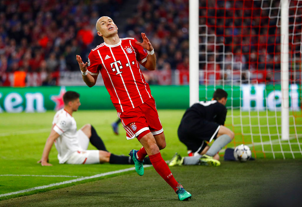 A goalless draw against Sevilla was enough to send Bayern Munich into the Champions League last four.