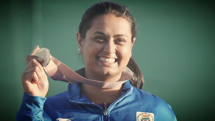 Shreyasi Singh celebrates after winning the gold medal women’s double trap final at the Belmont Shooting Centre on Wednesday.&nbsp;
