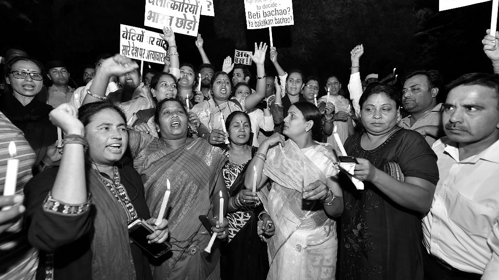Protesters during a midnight candlelight vigil against the Kathua and Unnao rape cases.