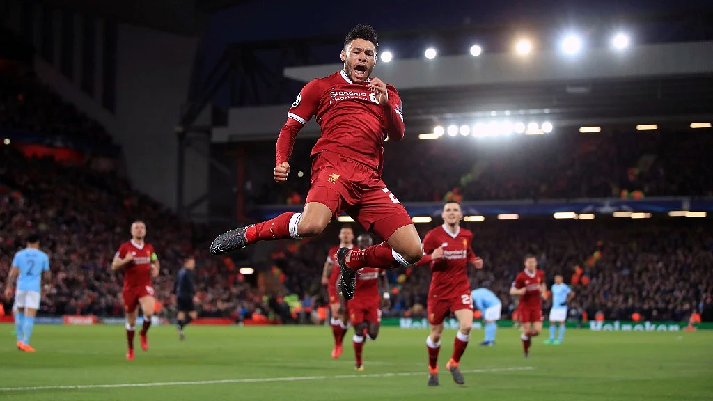 Liverpool’s Alex Oxlade-Chamberlain celebrates after scoring his side’s second goal of the game during the first leg of the Champions League quarter final match against Manchester City at Anfield last week.
