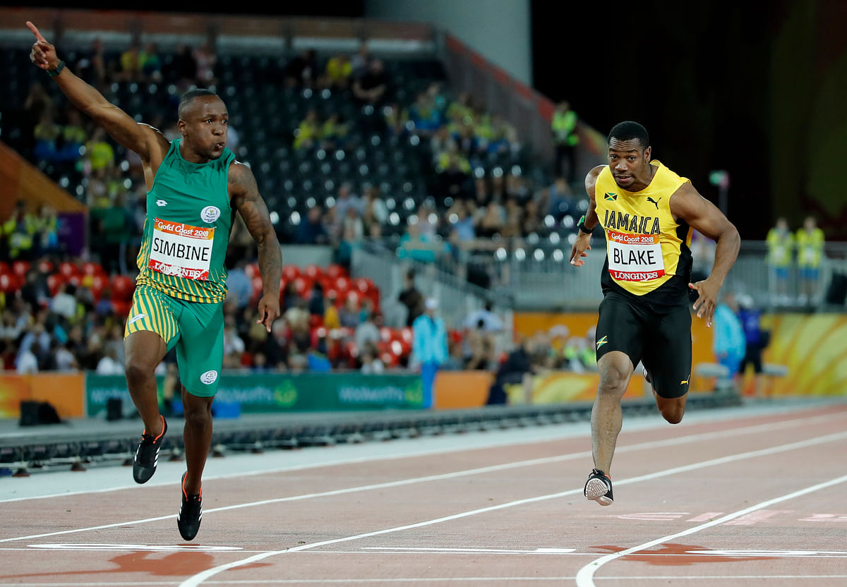 Akani Simbine led Henricho Bruintjies in a South Africa 1-2 finish in the 100 meters at the Commonwealth Games