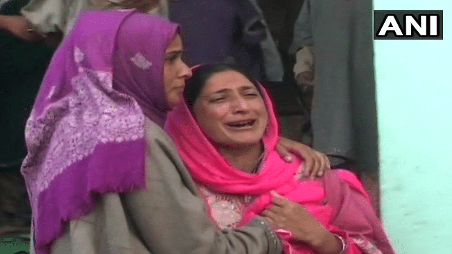 Relatives of the man and his son who were abducted by terrorists.