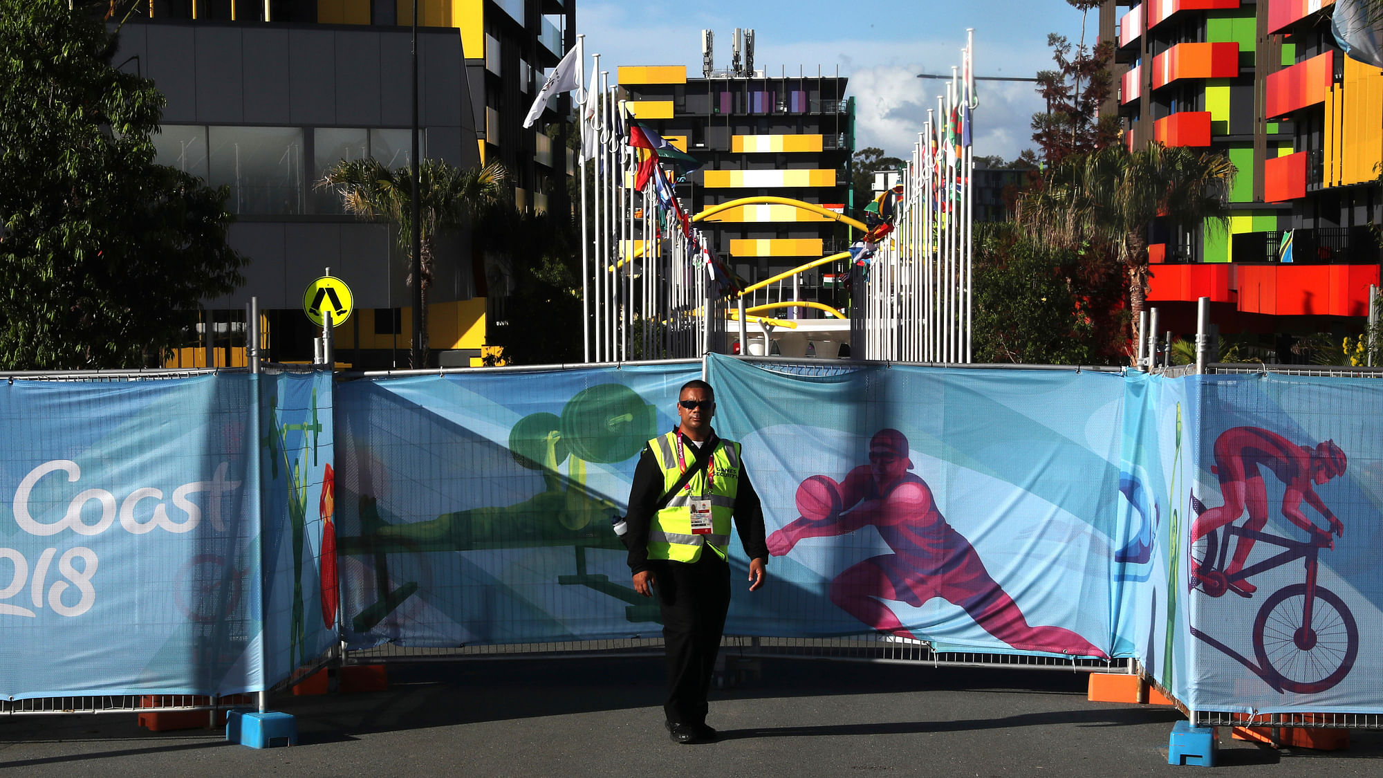 A police officer stands guard at the Commonwealth Games village in Gold Coast.