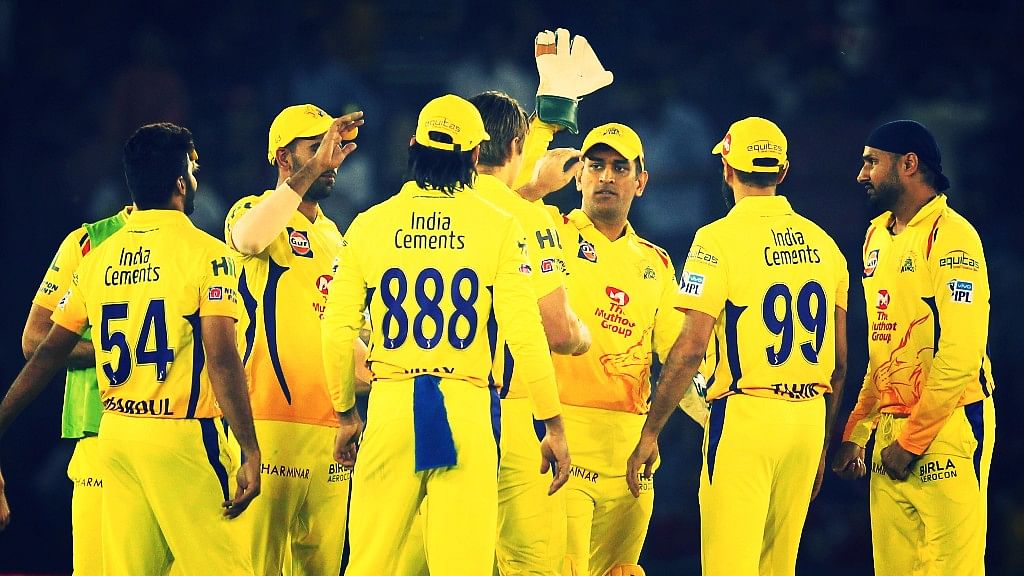 The Chennai Super Kings players celebrate a wicket.