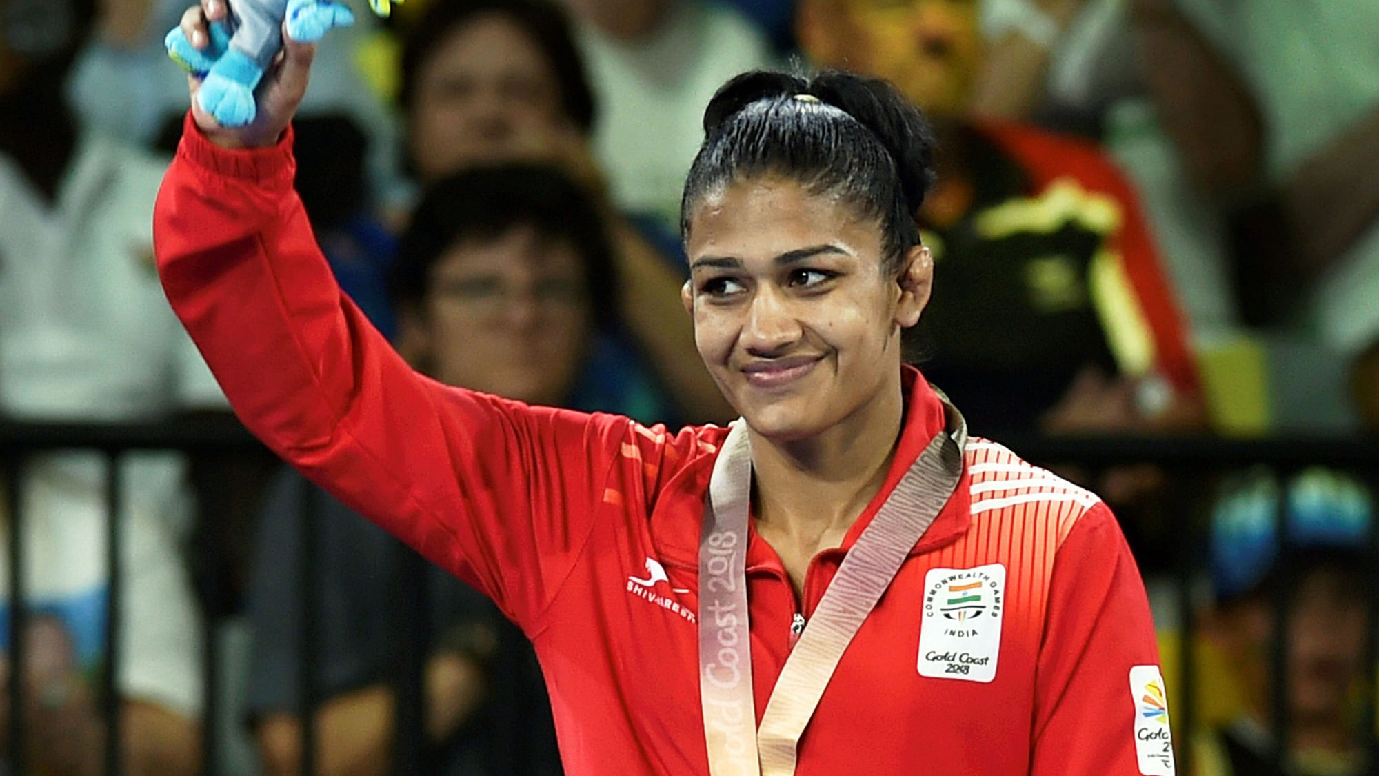 Babita Kumari stands on the podium after winning a silver medal at CWG 2018.