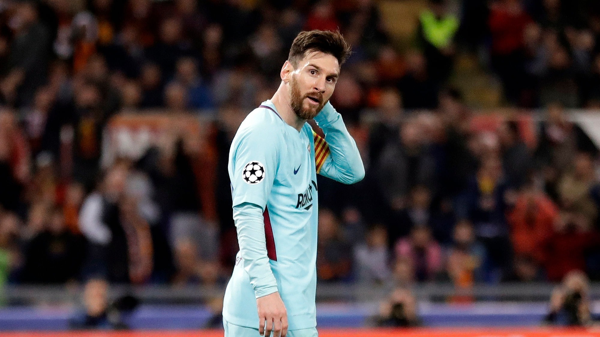 Barcelona’s Lionel Messi reacts after missing a scoring chance during the Champions League quarterfinal second leg soccer match between Roma and FC Barcelona at Rome’s Olympic Stadium, Tuesday, April 10, 2018.