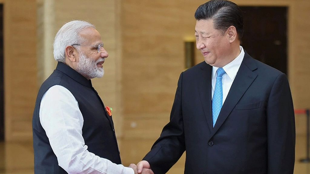 PM Narendra Modi with Chinese President Xi Jinping in Wuhan, China.&nbsp;