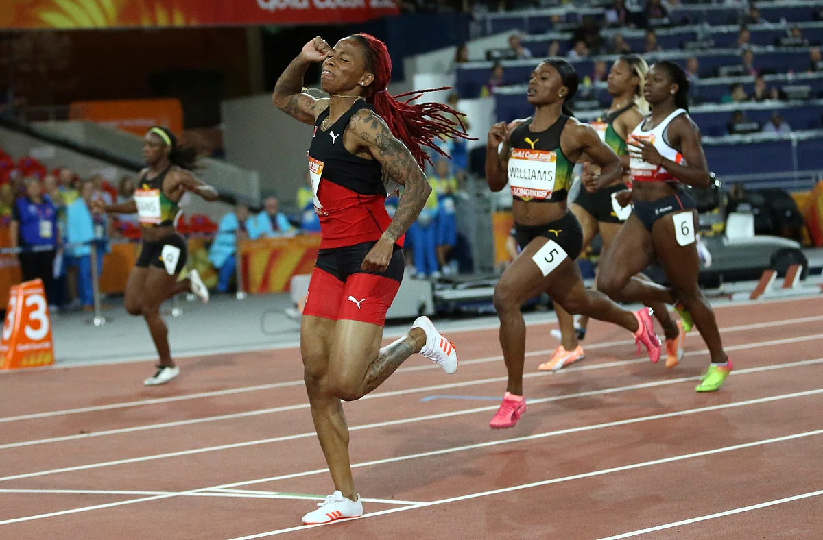 Michelle-Lee Ahye of Trinidad and Tobago crosses the finish line to win the women’s 100m final at Carrara Stadium during the Commonwealth Games on the Gold Coast, Australia, Monday, April 9, 2018. 
