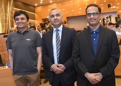 Bengaluru: Infosys CFO M D Ranganath, CEO and MD Salil Parekh and COO UB Pravin Rao during a press conference in Bengaluru, on April 13, 2018. (Photo: IANS)