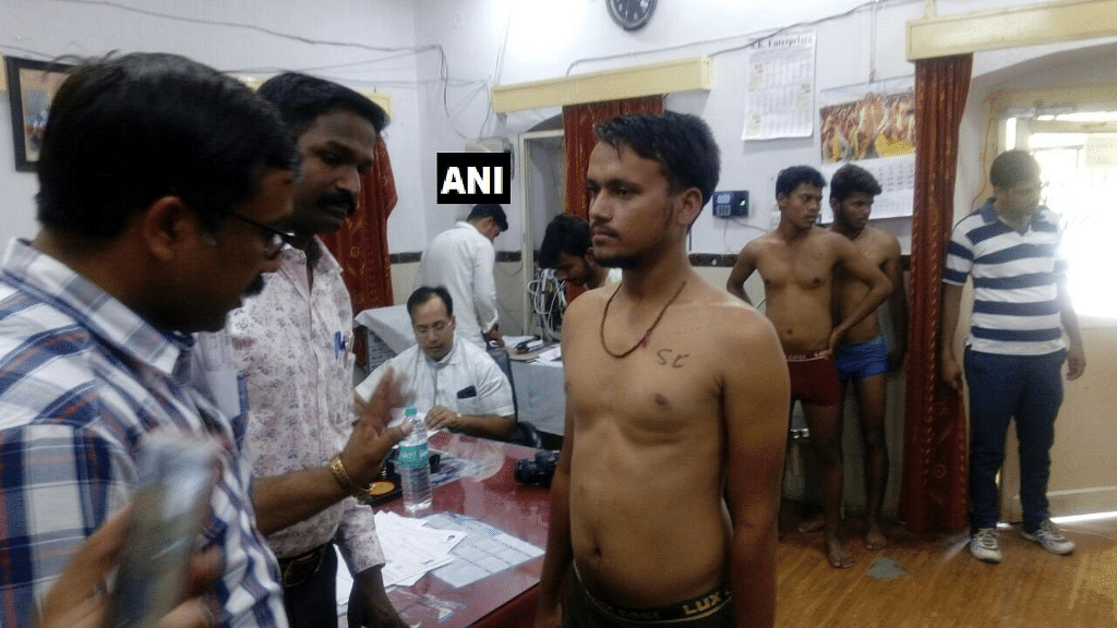 Candidates for the post of Constable labelled with their respective castes on their chest during medical examination.&nbsp;