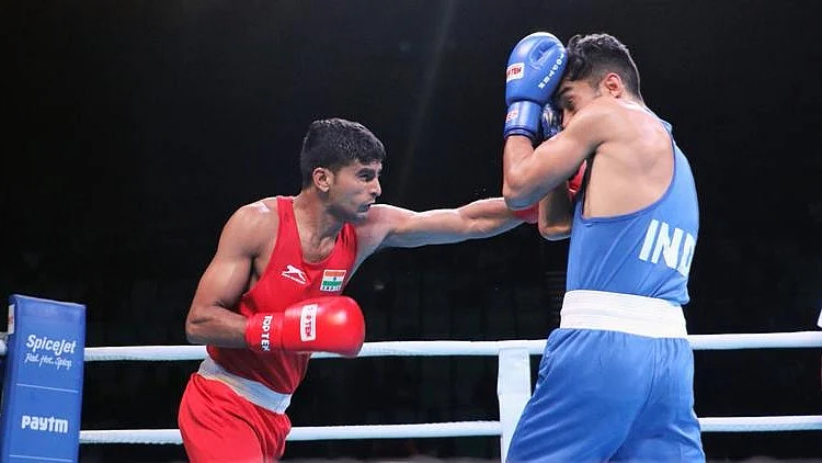 File picture of Manish Kaushik (in red).
