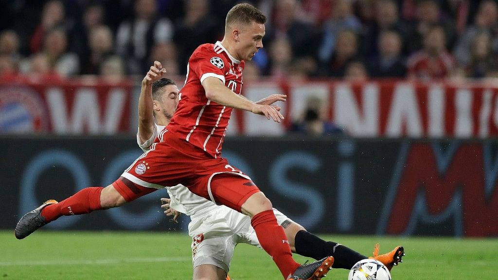 Sevilla’s Sergio Escudero challenges Bayern’s Joshua Kimmich during the Champions League quarter final second leg soccer match between FC Bayern Munich and Sevilla FC at the Allianz Arena stadium in Munich, Germany.