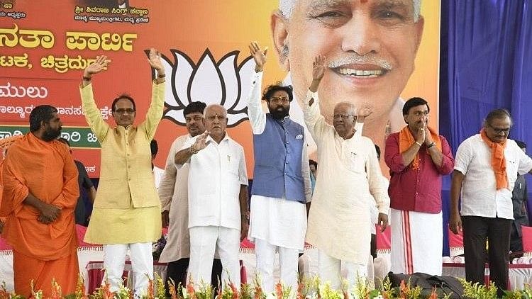 Janardhan Reddy on the dais with BJP leader BS Yeddyurappa and Madhya Pradesh Chief Minister Shivraj Singh Chouhan.