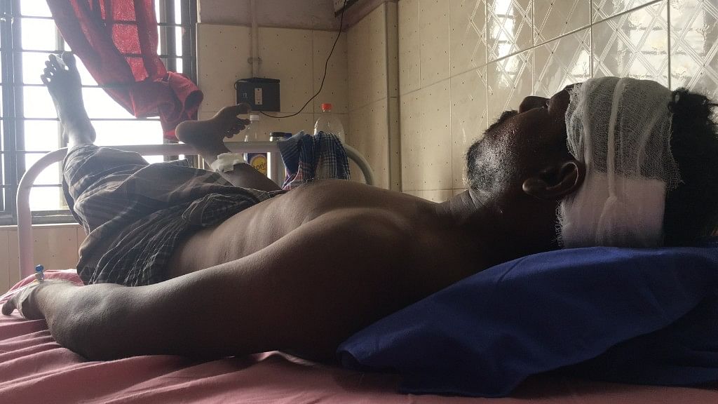 Vinoba was shot in the leg and a bullet grazed past his head. Lathi marks are quite evident on his back. Bed-ridden, he is clueless how he will support his family.