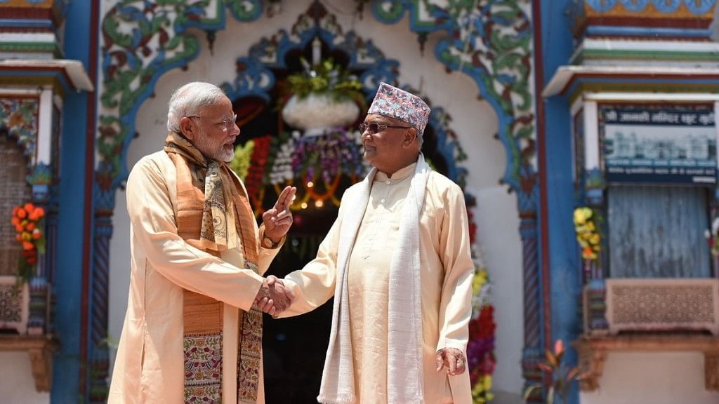 PM Modi with his Nepali counterpart KP Oli on Friday, 11 May.&nbsp;