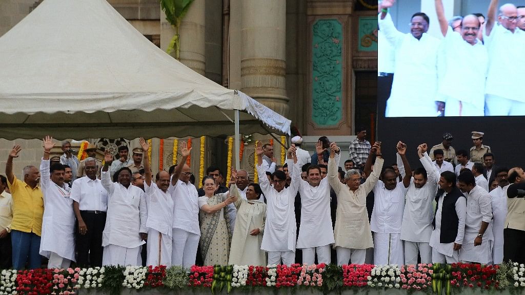 Opposition leaders, including Congress’ Sonia Gandhi and Rahul Gandhi, SP’s Akhilesh Yadav, AP CM Chandrababu Naidu, WB CM Mamata Banerjee, RJD’s Tejashwi Yadav, CPI(M)‘s Sitaram Yechury, NCP’s Sharad Pawar, and newly sworn-in Karnataka CM HD Kumaraswamy at the Vidhana Soudha in Bengaluru.