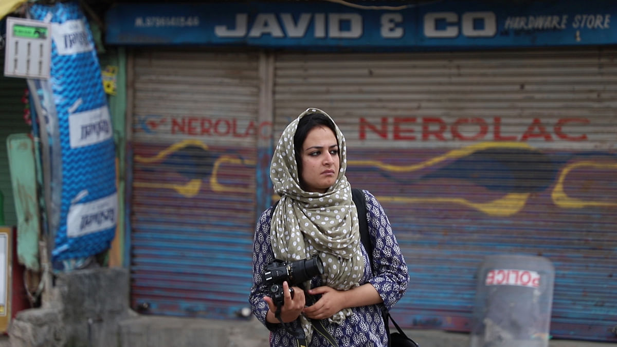 What is it like for women photojournalists who cover conflicts? 