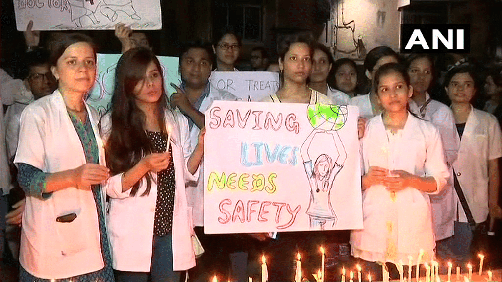 Doctors at the candlelight protest on Sunday.&nbsp;