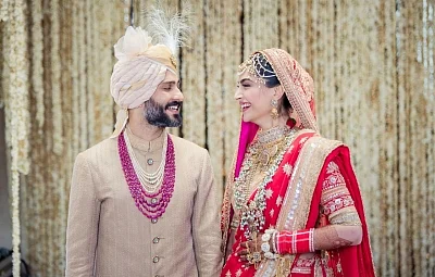 Mumbai: Actress Sonam Kapoor and Anand Ahuja during their wedding ceremony in Mumbai on May 8, 2018. 