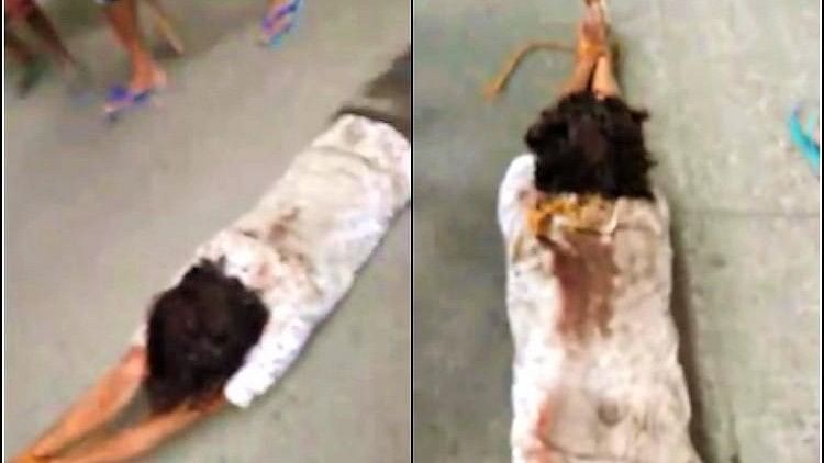 A chilling video of a man covered in blood, his hands tied up with a rope and being dragged on the road by two minor boys has emerged.