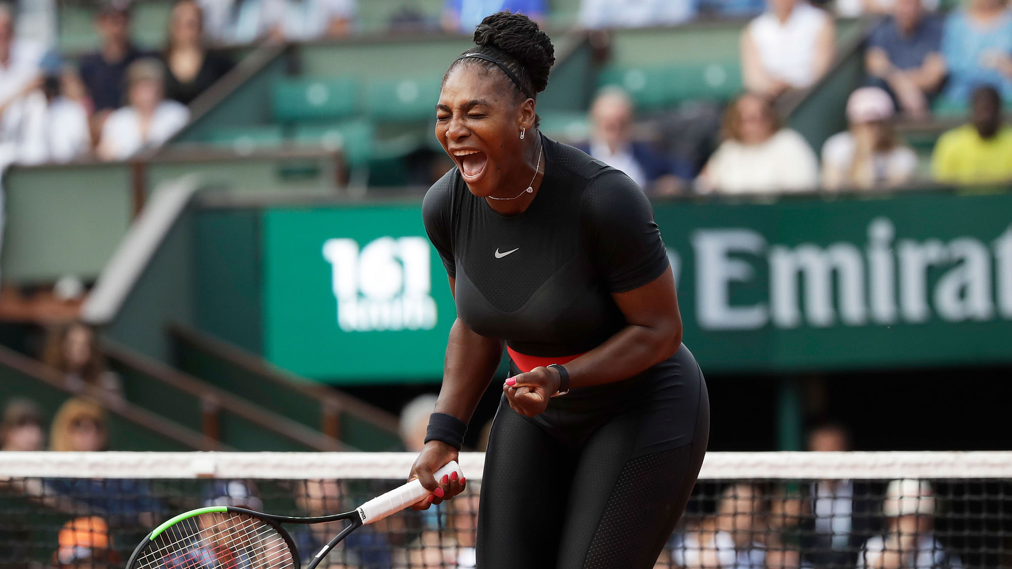 Serena Williams of the US celebrates winning her first round match of the French Open tennis tournament against Krystina Pliskova.