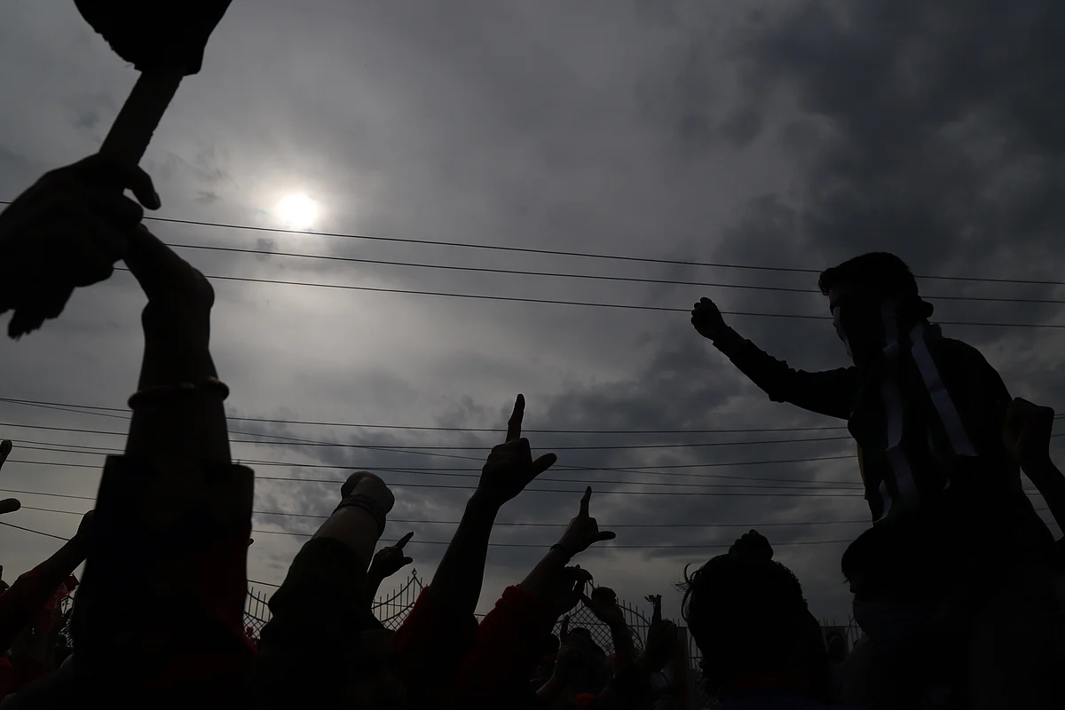 People at Adil Ahmad Yadoo’s funeral at Martyr’s graveyard Eidgah, Srinagar. 